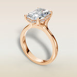 Radiant Tulip Curved Hidden Halo Split Shank engagement ring in rose gold, angled view