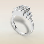 Emerald Five Stone Full Bezel engagement ring in white gold, angled view