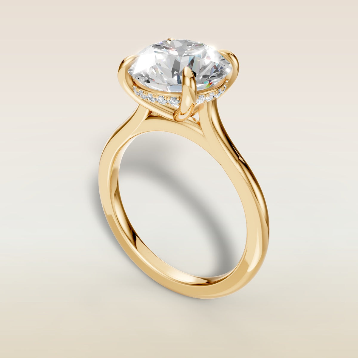 Round Hidden Halo Cathedral engagement ring in yellow gold, angled view