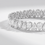 Lab grown diamond tennis bracelet with pear shaped diamonds in white gold