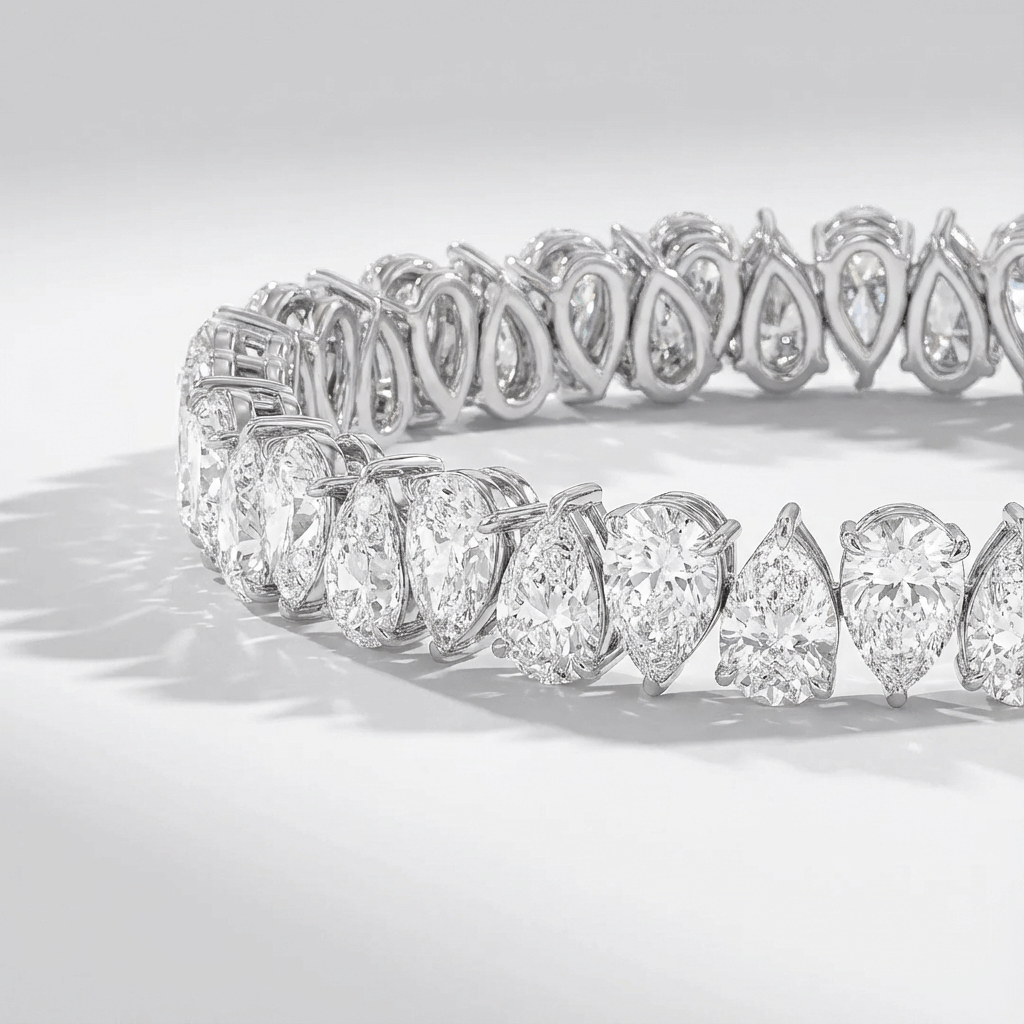 Lab grown diamond tennis bracelet with pear shaped diamonds in white gold