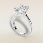 Cushion Tulip Curved Hidden Halo Double Prong engagement ring in white gold, angled view