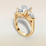 Pear Tulip Three Stone Diamond Bridge engagement ring in yellow gold, back angle
