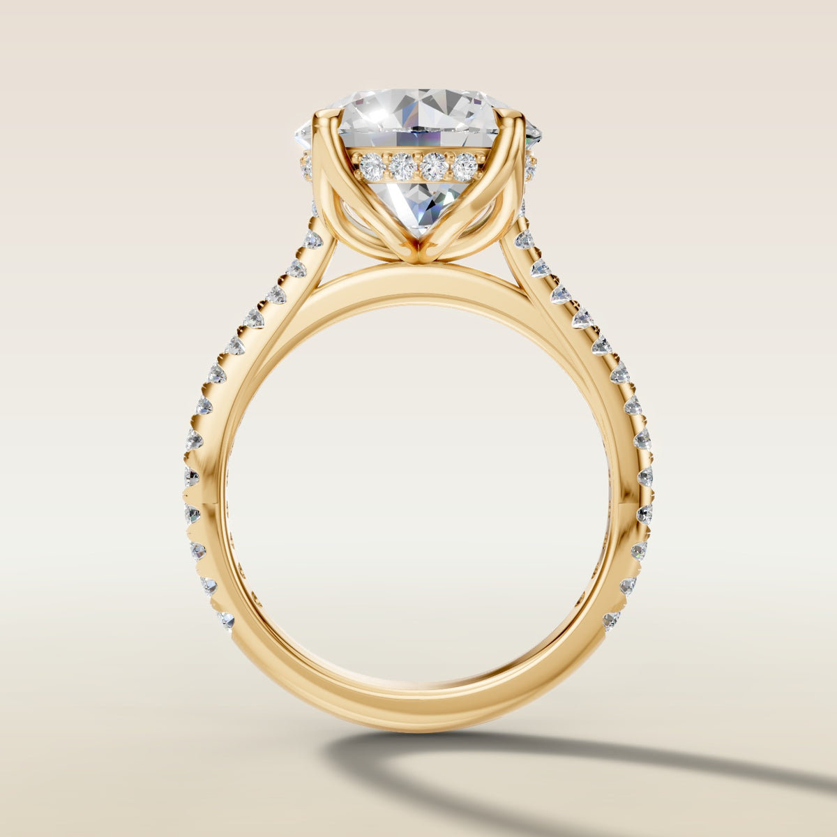 Round Tulip Hidden Halo Pave engagement ring in yellow gold, front view