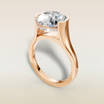Round Half Bezel with Hidden Halo engagement ring in rose gold, angled view
