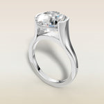 Round Half Bezel with Hidden Halo engagement ring in white gold, angled view
