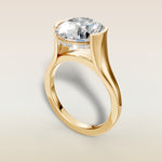 Round Half Bezel with Hidden Halo engagement ring in yellow gold, angled view