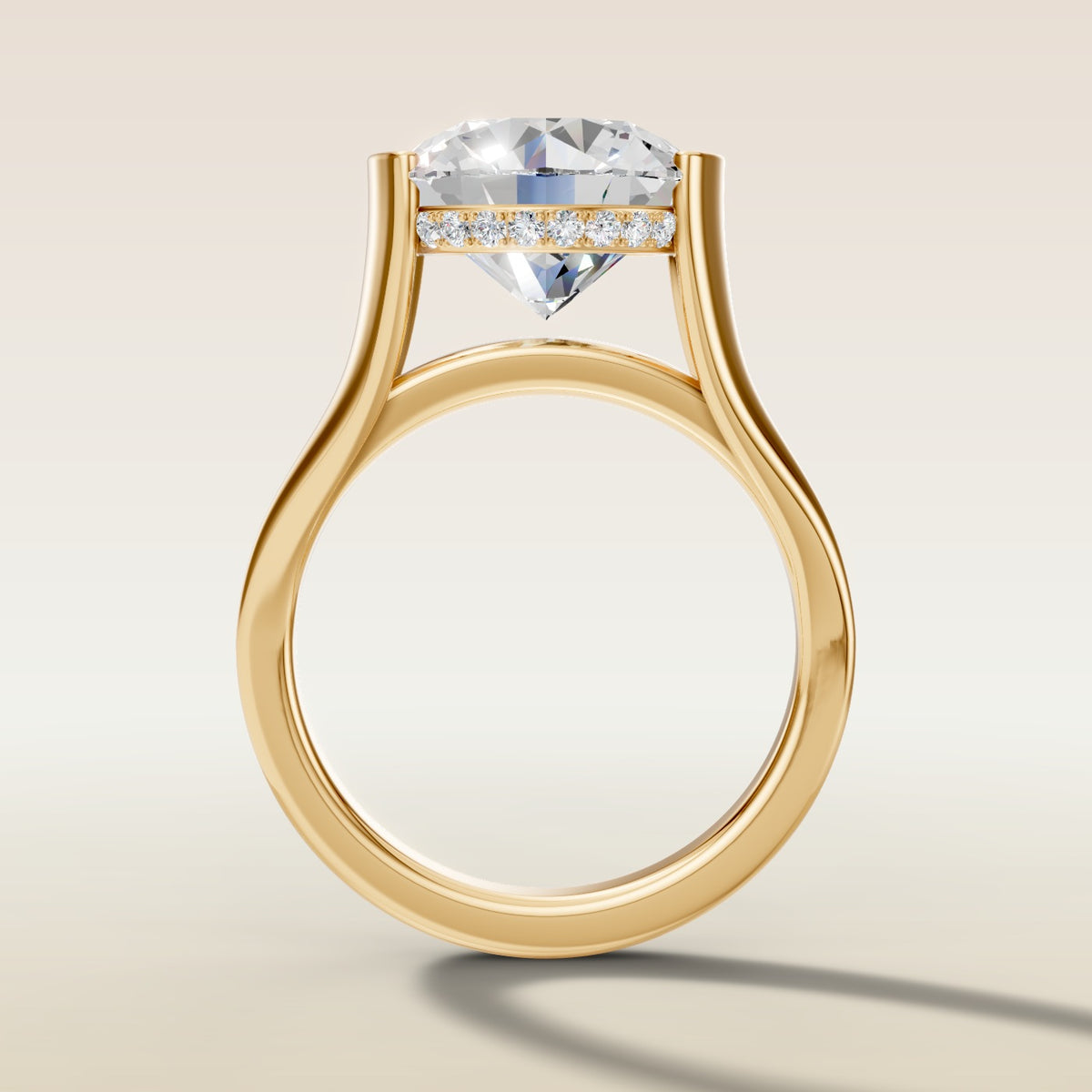 Round Half Bezel with Hidden Halo engagement ring in yellow gold, front view