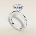 Round Six Petal Tulip Solitaire engagement ring in white gold, angled view