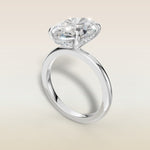 Oval Hidden Halo Solitaire engagement ring in white gold, angled view