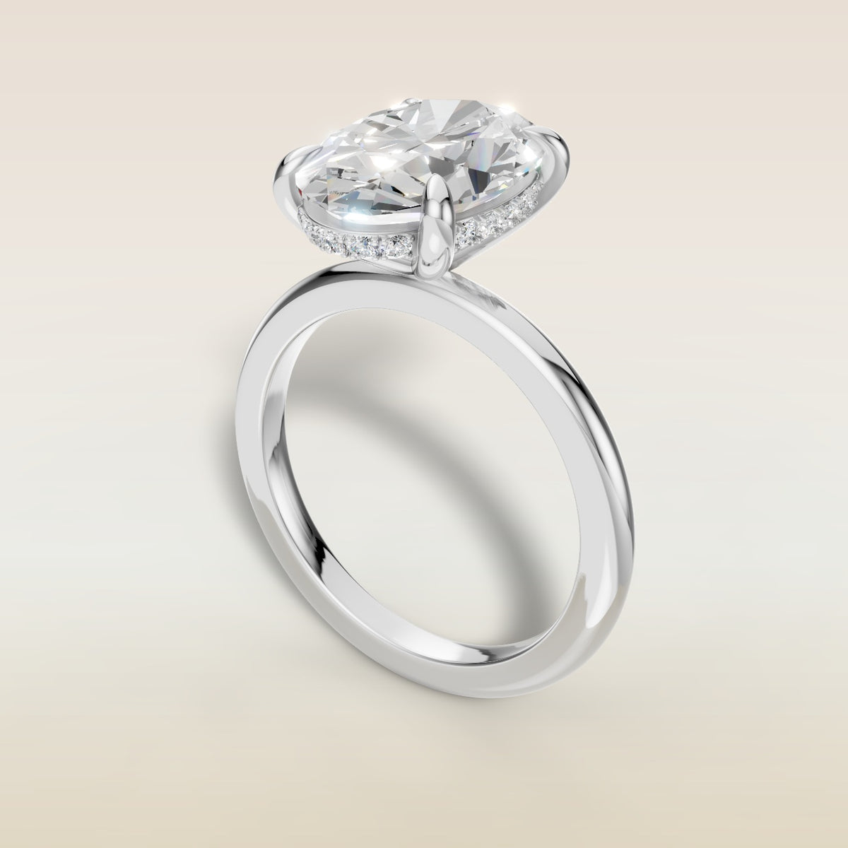 Oval Hidden Halo Solitaire engagement ring in white gold, angled view