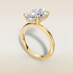 Oval Hidden Halo Solitaire engagement ring in yellow gold