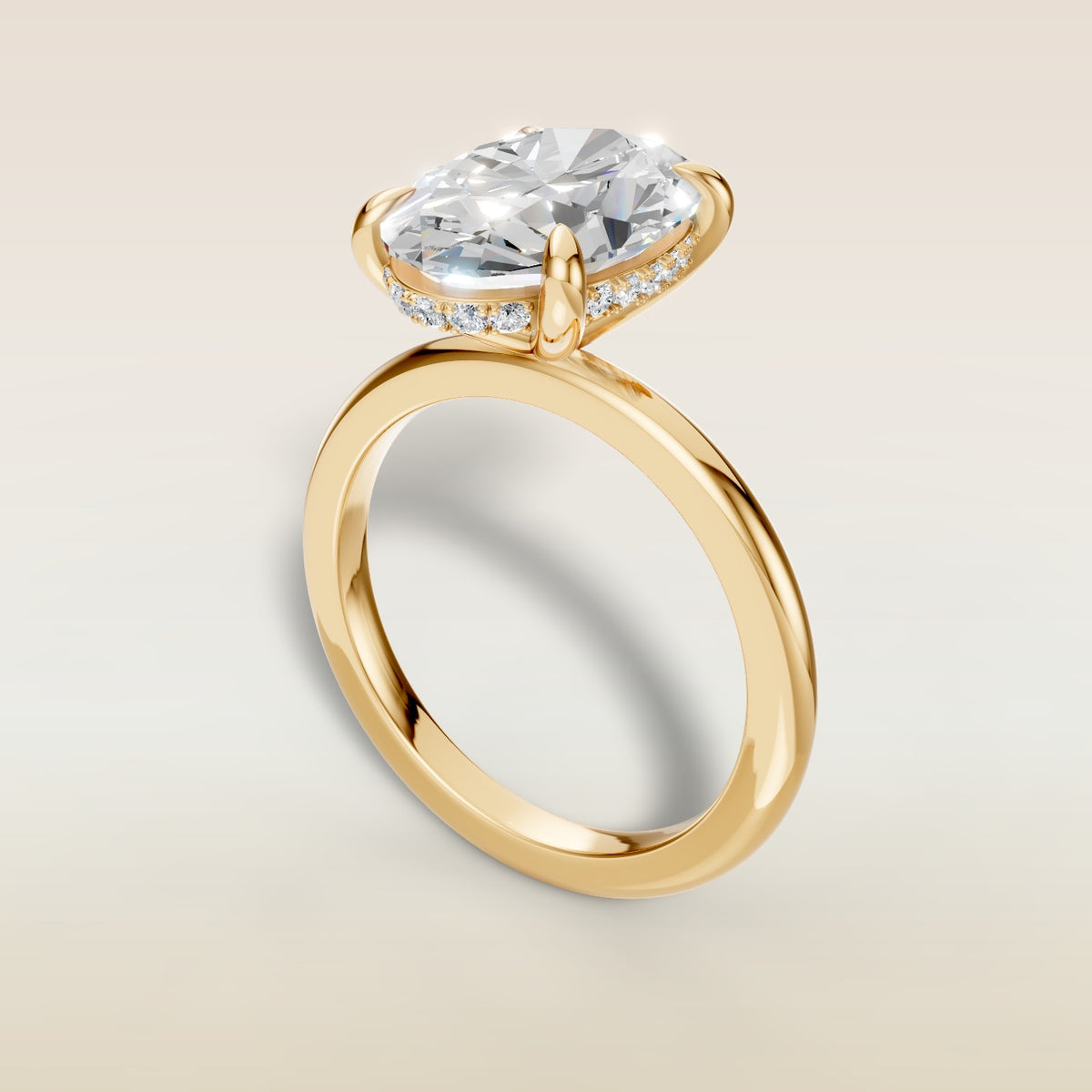 Oval Hidden Halo Solitaire engagement ring in yellow gold, angled view