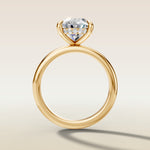 Oval Hidden Halo Solitaire engagement ring in yellow gold, front view