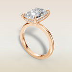 Radiant Hidden Halo Solitaire engagement ring in rose gold, angled view