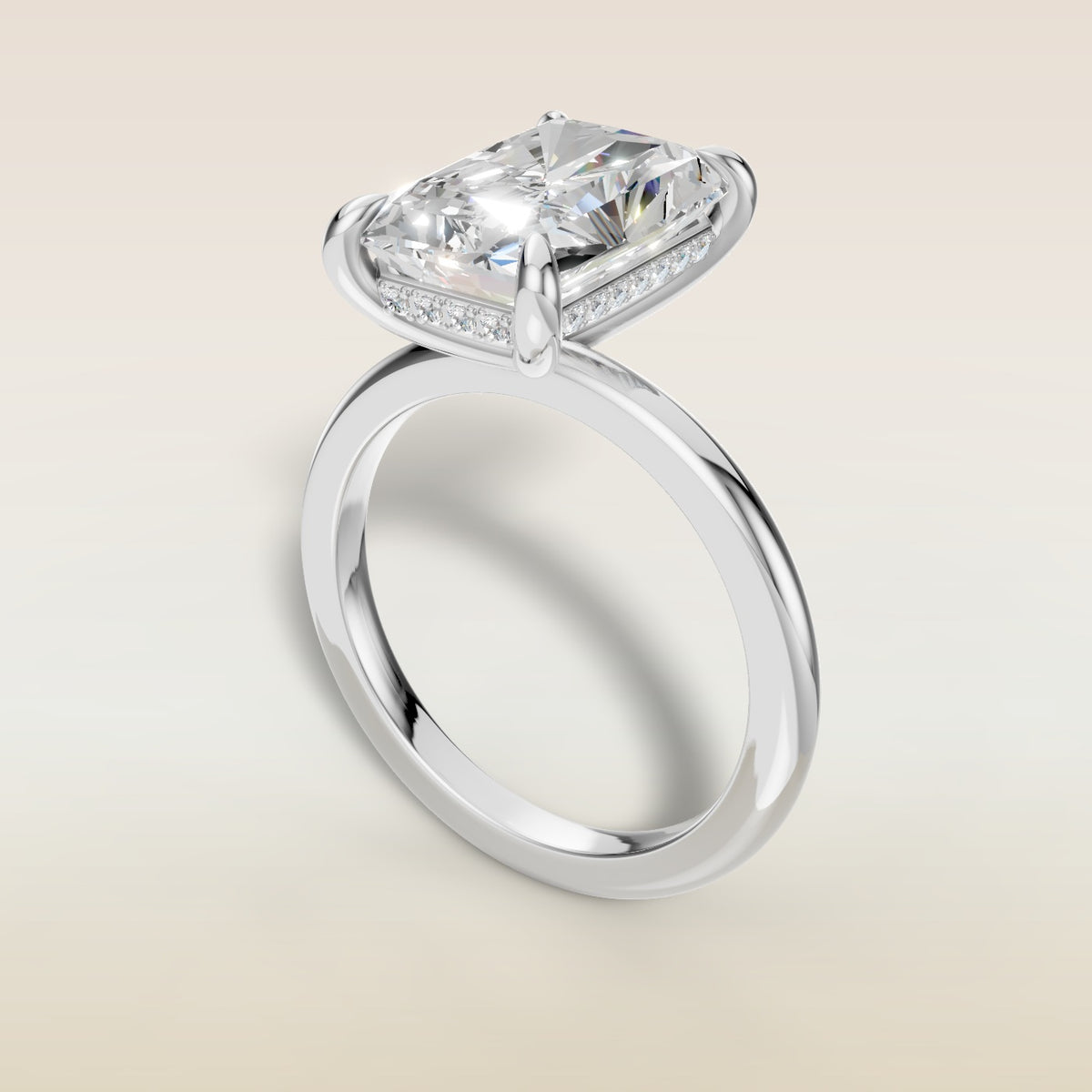 Radiant Hidden Halo Solitaire engagement ring in white gold, angled view