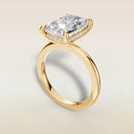 Radiant Hidden Halo Solitaire engagement ring in yellow gold, angled view
