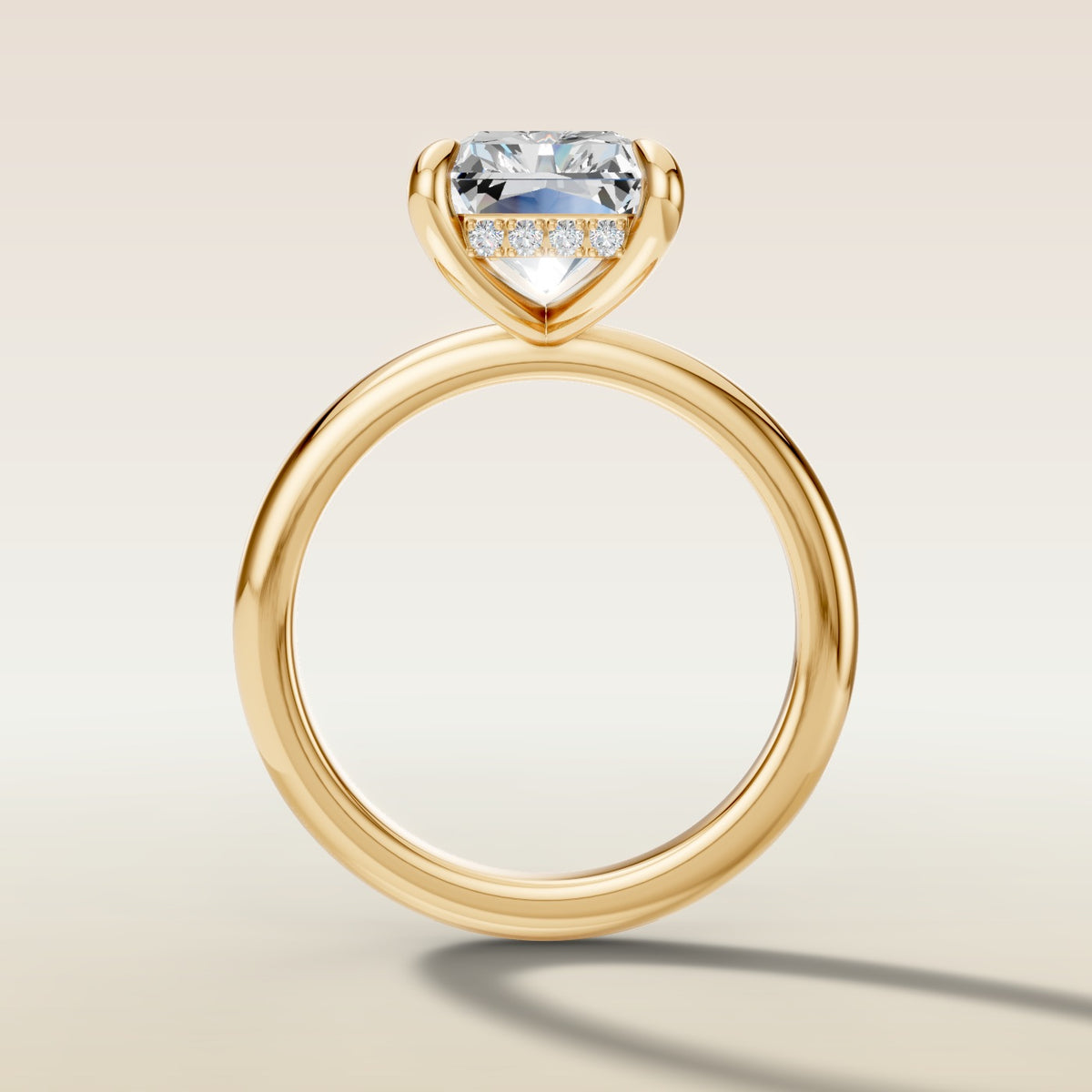 Radiant Hidden Halo Solitaire engagement ring in yellow gold, front view