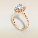 Pear Tulip with Hidden Halo engagement ring in rose gold, angled view
