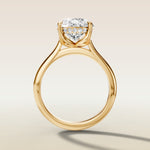 Pear Tulip with Hidden Halo engagement ring in yellow gold, front view