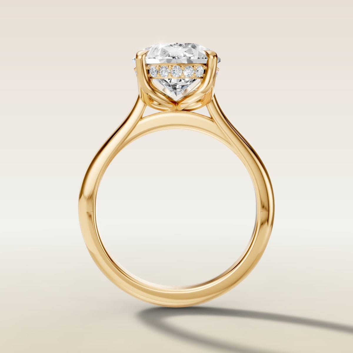 Pear Tulip with Hidden Halo engagement ring in yellow gold, front view