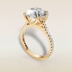 Round Tulip Classic Pave engagement ring in yellow gold, angled view