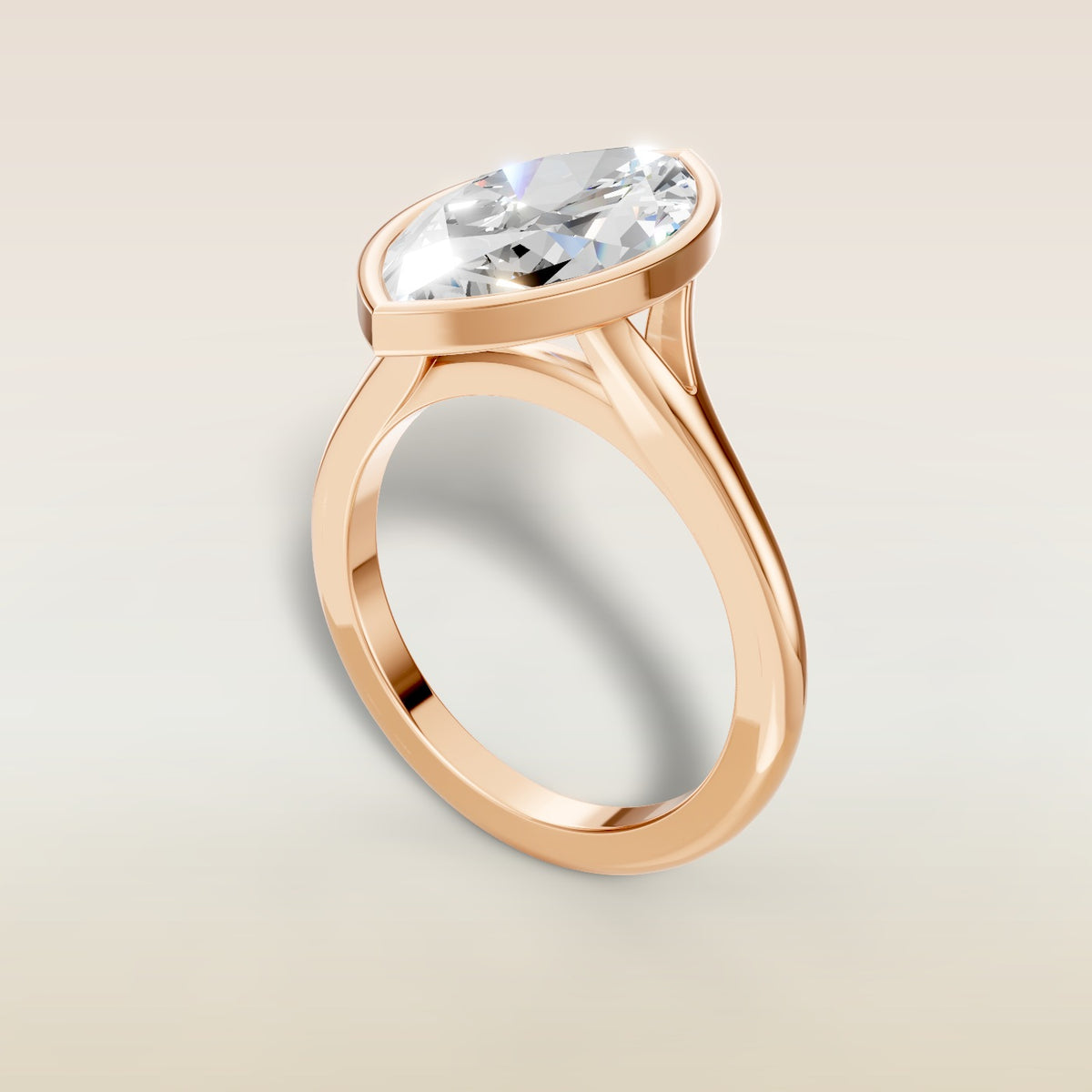 Marquise Full Bezel Split Shank engagement ring in rose gold, angled view