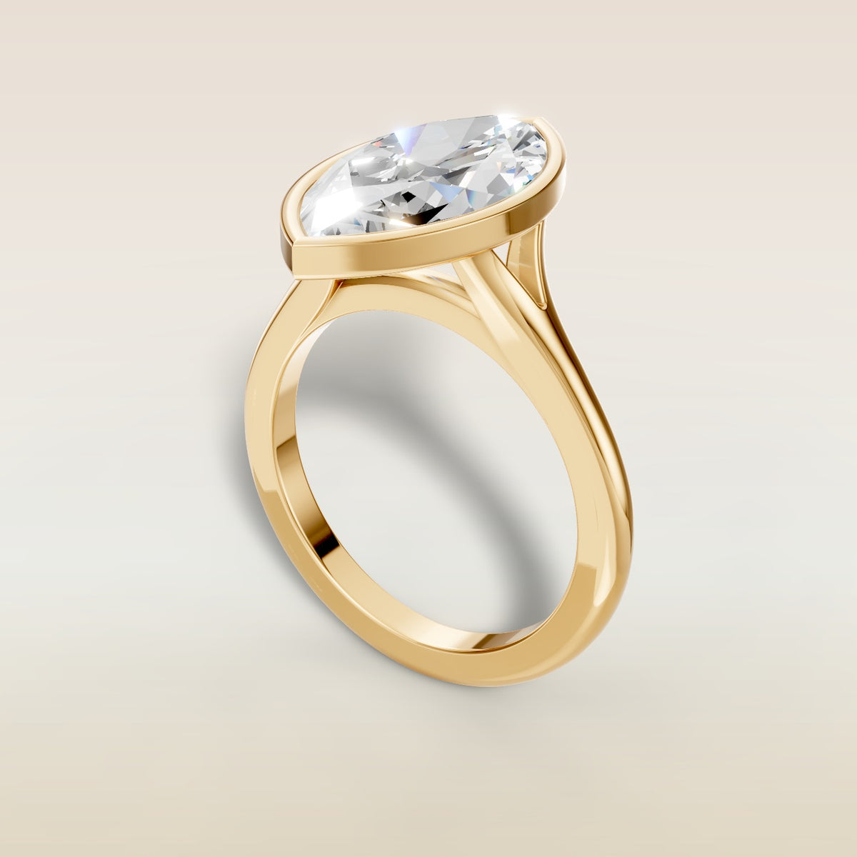 Marquise Full Bezel Split Shank engagement ring in yellow gold, angled view