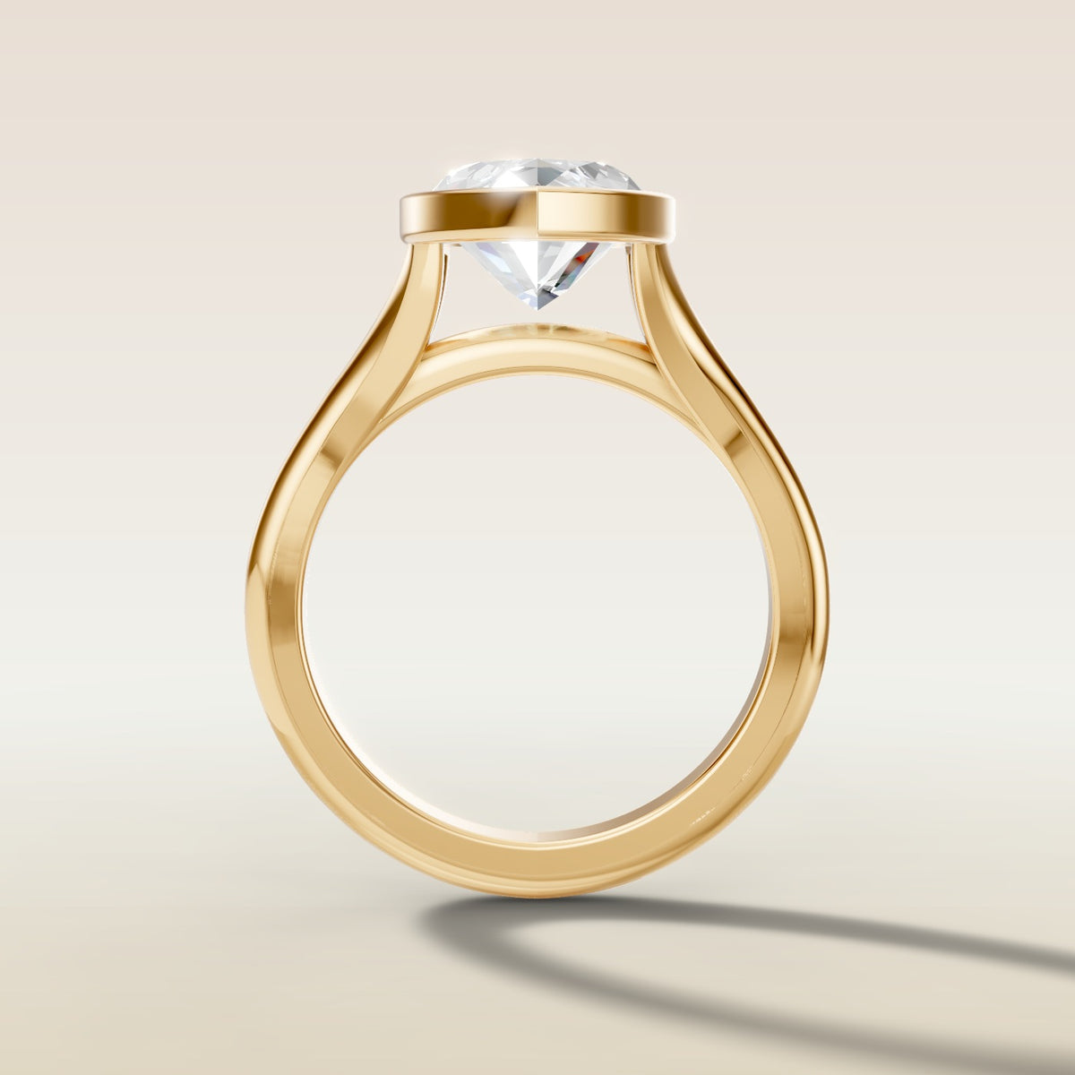 Marquise Full Bezel Split Shank engagement ring in yellow gold, front view