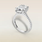 Pear Tulip Classic Pave engagement ring in white gold, angled view