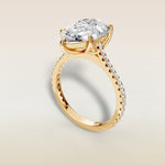 Pear Tulip Classic Pave engagement ring in yellow gold, angled view
