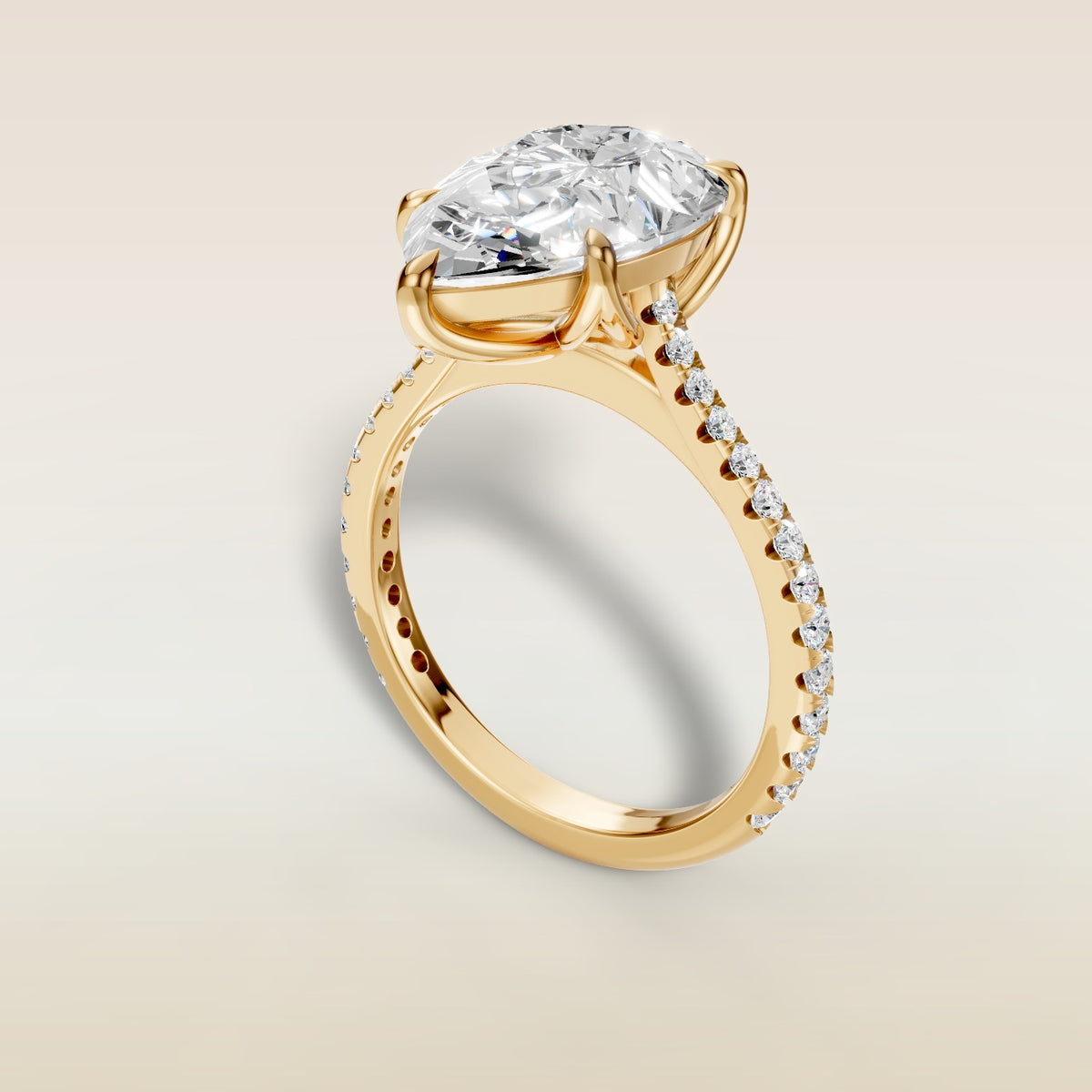 Pear Tulip Classic Pave engagement ring in yellow gold, angled view