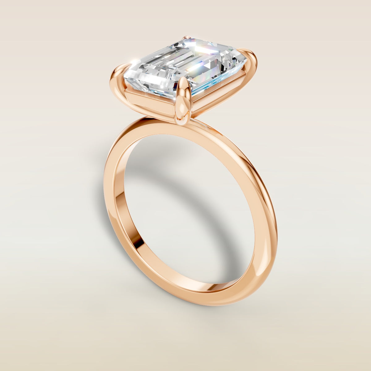 Emerald Classic Solitaire engagement ring in rose gold, angled view