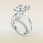 Emerald Classic Solitaire engagement ring in white gold, angled view