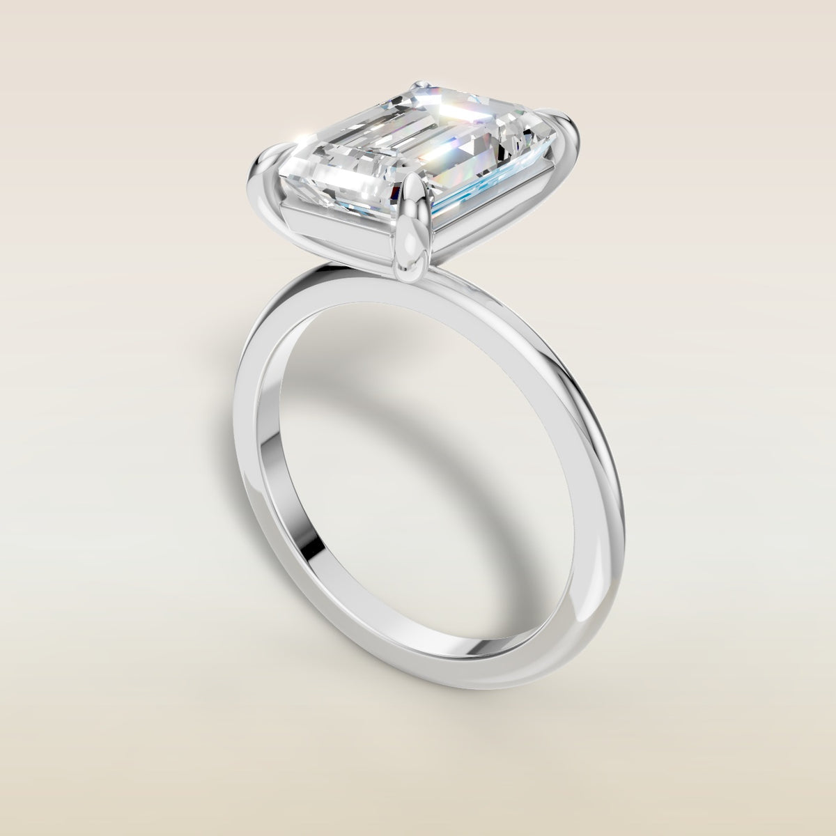 Emerald Classic Solitaire engagement ring in white gold, angled view