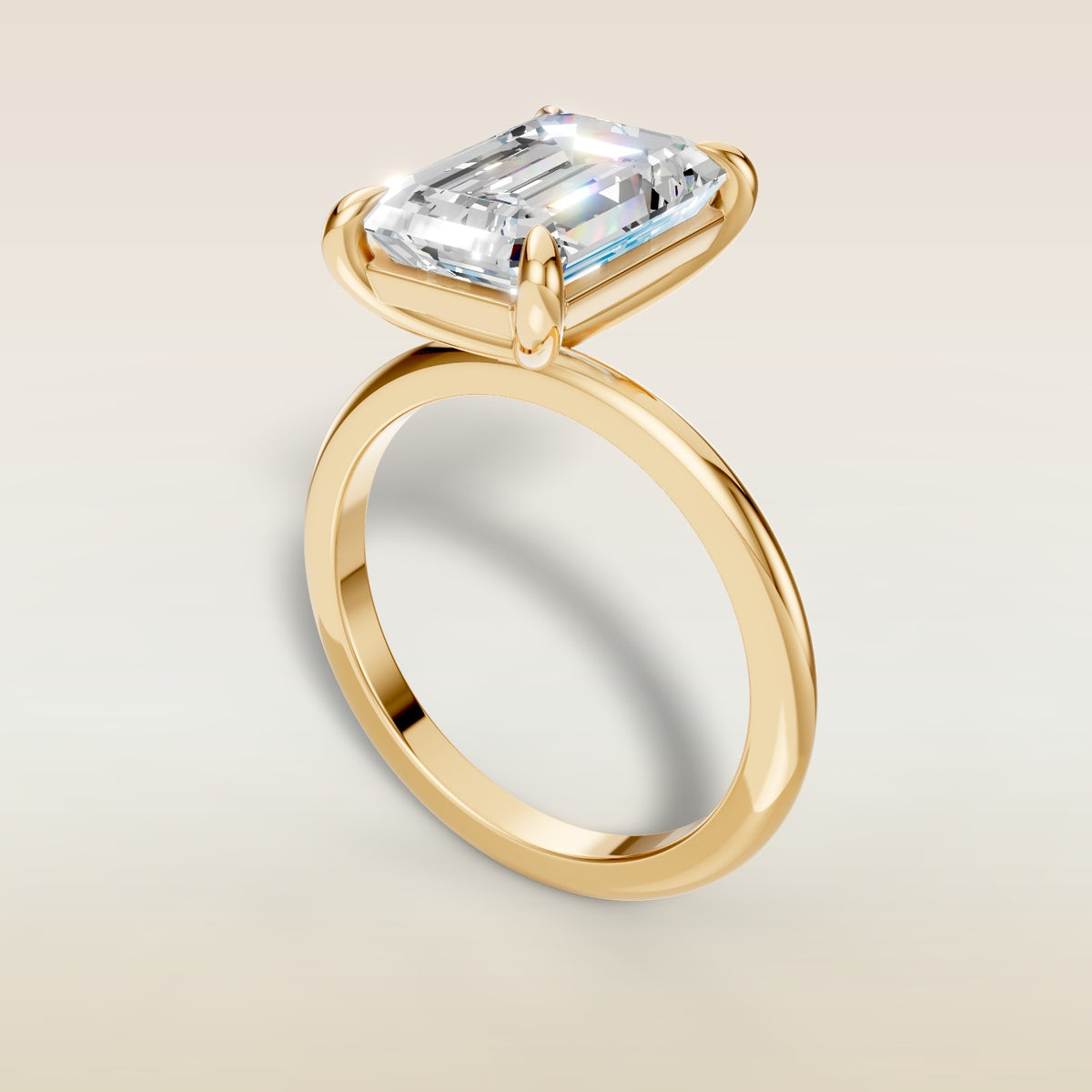 Emerald Classic Solitaire engagement ring in yellow gold, angled view