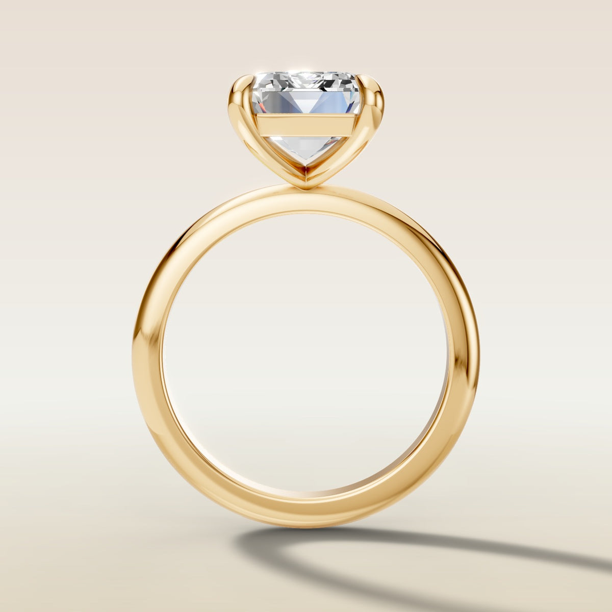 Emerald Classic Solitaire engagement ring in yellow gold, front view