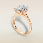 Oval Tulip with Hidden Halo engagement ring in rose gold, angled view