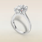 Oval Tulip with Hidden Halo engagement ring in white gold, angled view