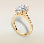 Oval Tulip with Hidden Halo engagement ring in yellow gold, angled view