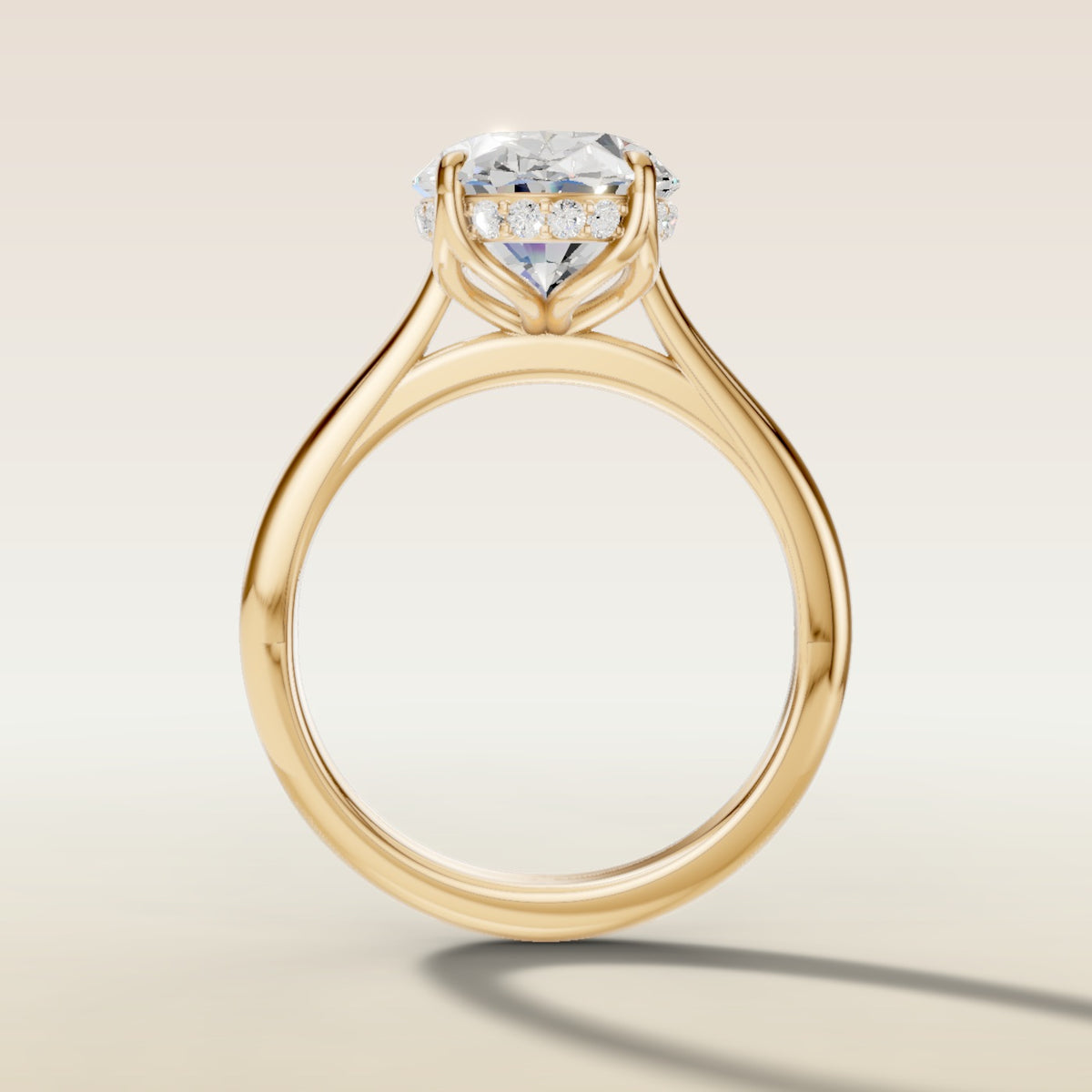 Oval Tulip with Hidden Halo engagement ring in yellow gold
