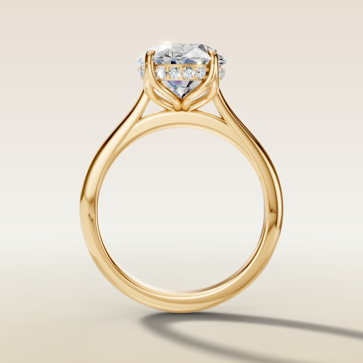 Oval Tulip with Hidden Halo engagement ring in yellow gold, front view