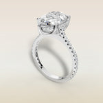 Pear Tulip Hidden Halo Pave engagement ring in white gold, angled view