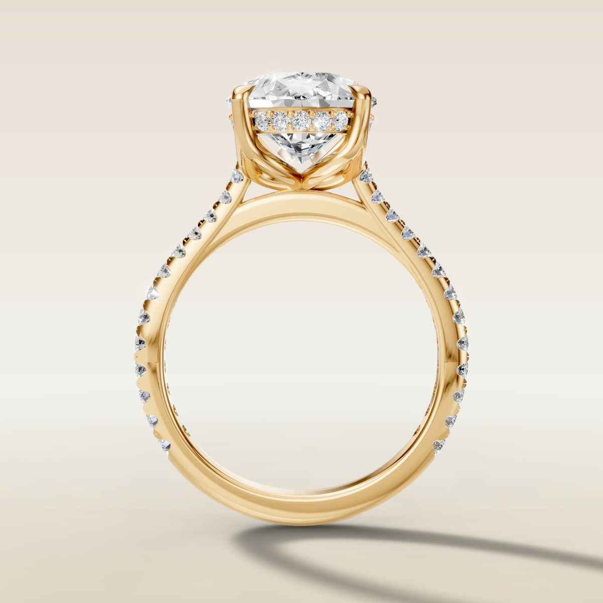 Pear Tulip Hidden Halo Pave engagement ring in yellow gold, front view