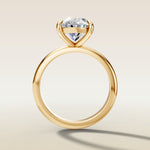 Oval Classic Solitaire engagement ring in yellow gold, front view