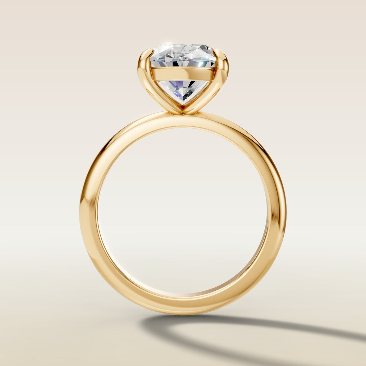 Oval Classic Solitaire engagement ring in yellow gold, front view