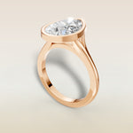 Pear Full Bezel Split Shank engagement ring in rose gold, angled view