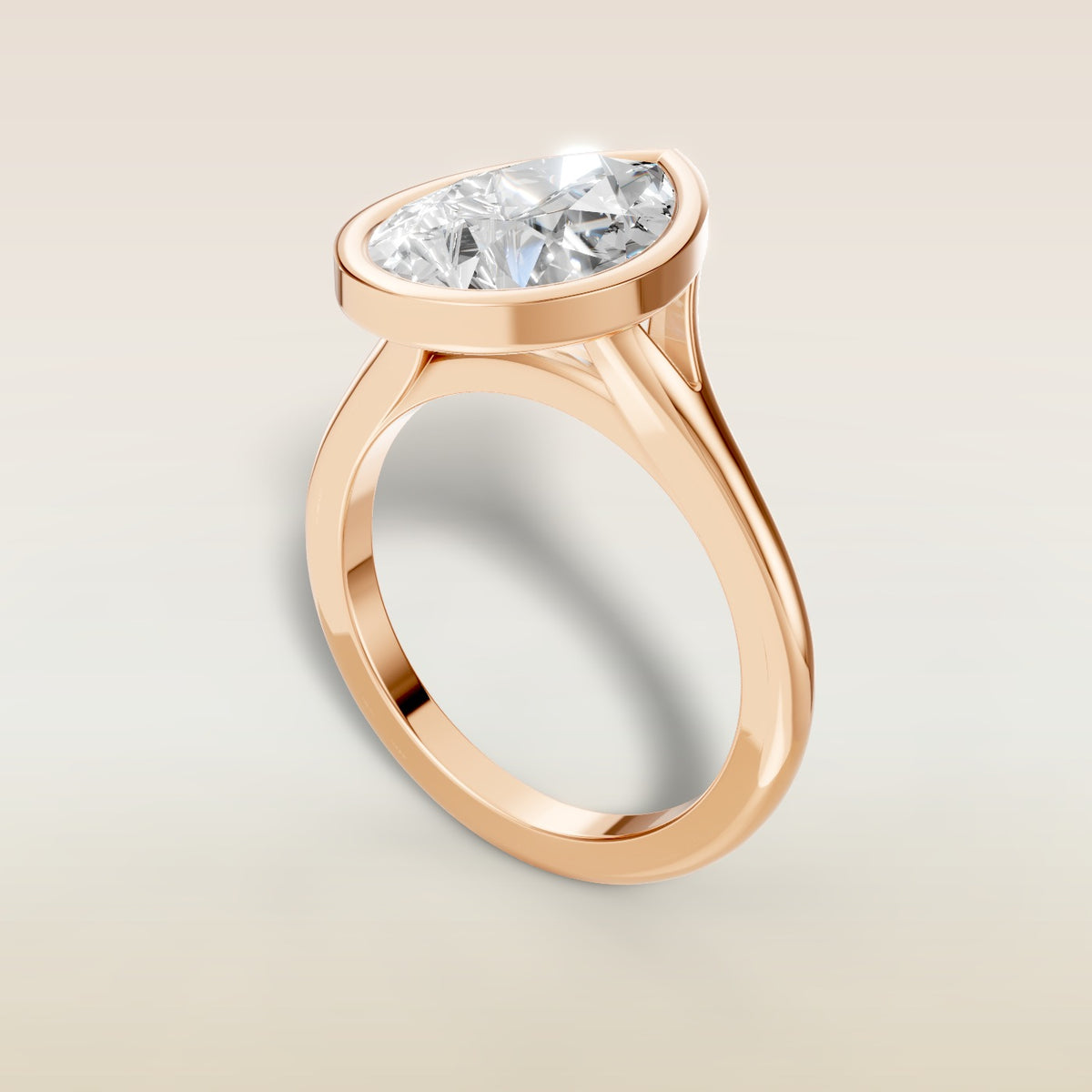Pear Full Bezel Split Shank engagement ring in rose gold, angled view