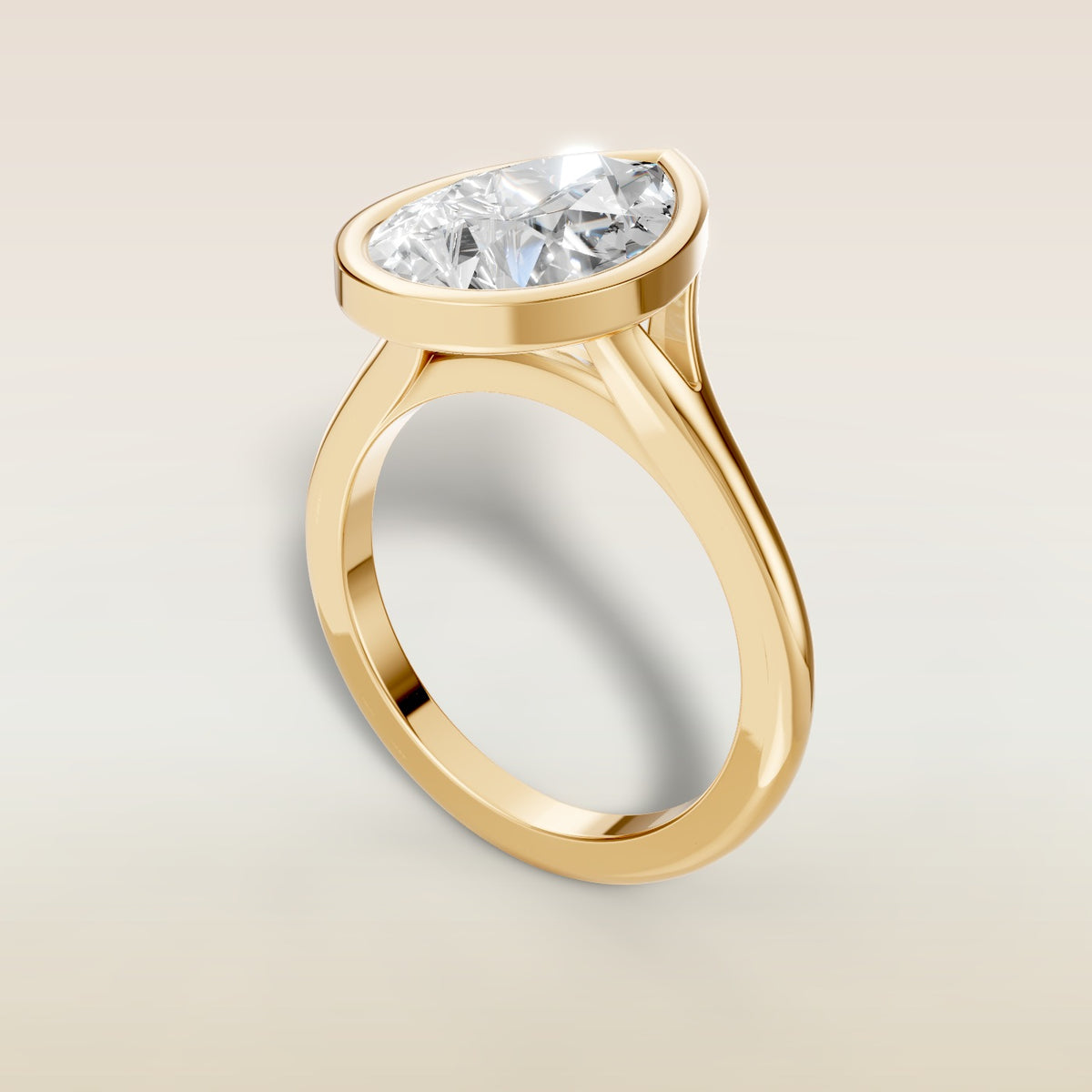 Pear Full Bezel Split Shank engagement ring in yellow gold, angled view