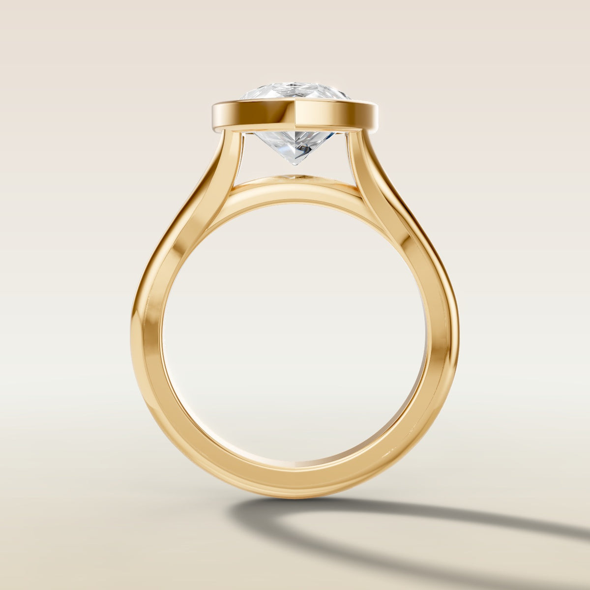 Pear Full Bezel Split Shank engagement ring in yellow gold, front view